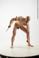 Nude Fighting with spear Man White Muscular Bald Realistic